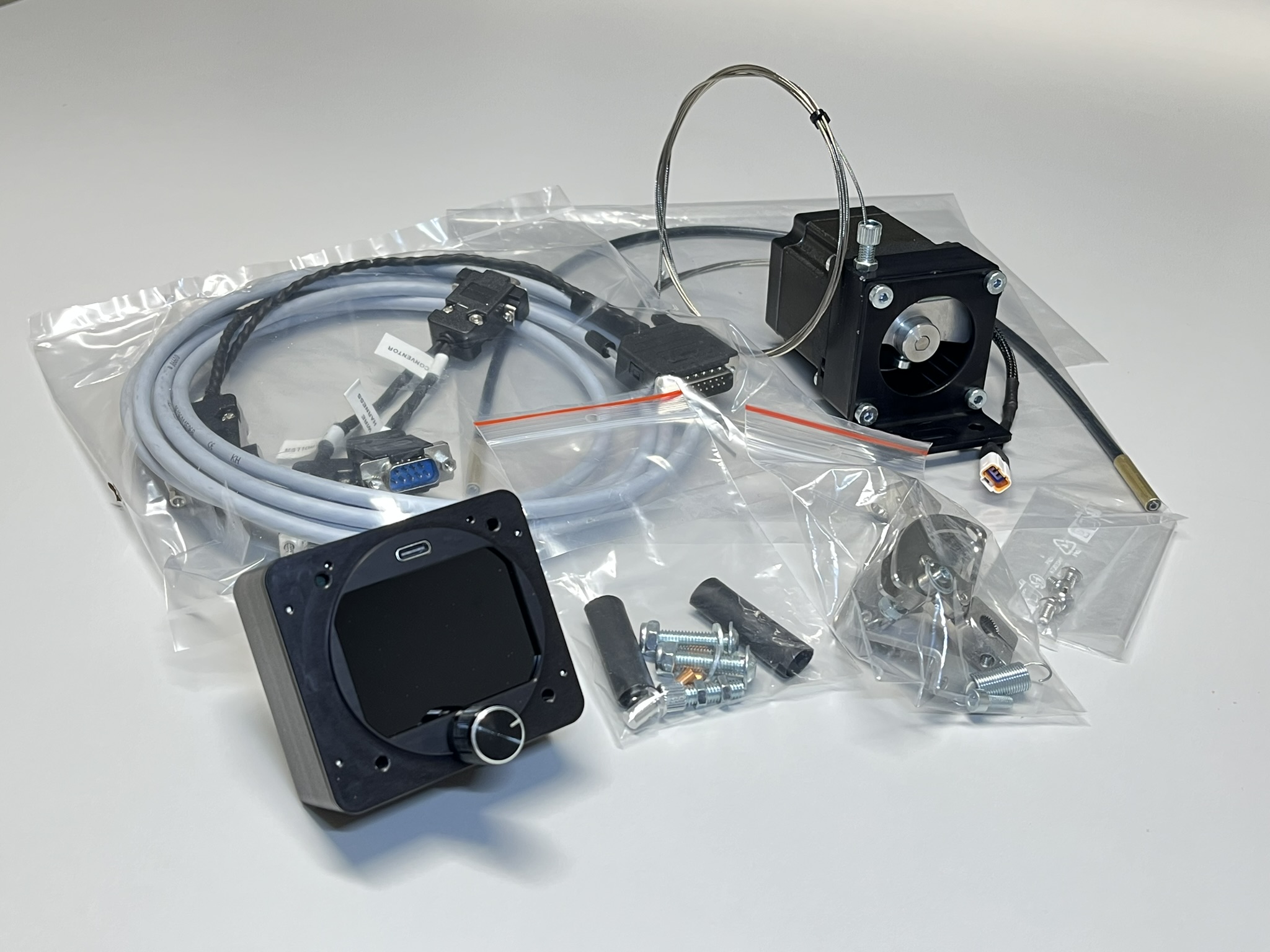 Full package with all items of the Mavionics Governor Controller system, prepared for installation.